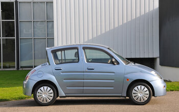 Toyota Will Vi  - Zijkant